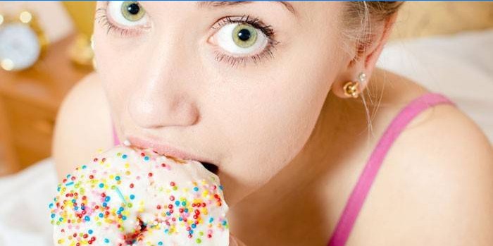Girl eats donut