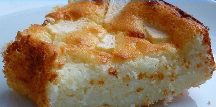 Slice of casserole with apples from cottage cheese dough with semolina