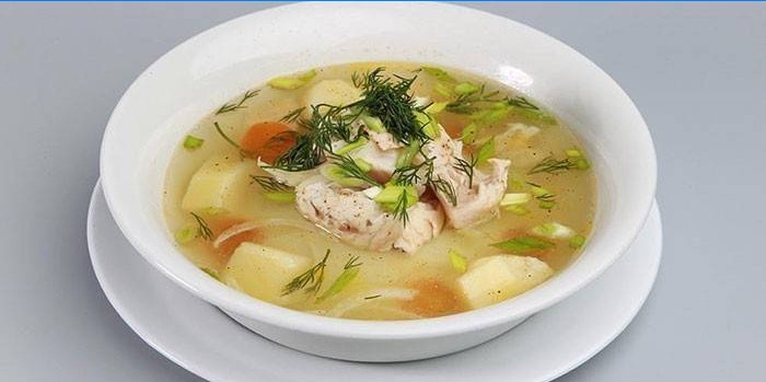 Fish soup with slices of pink salmon