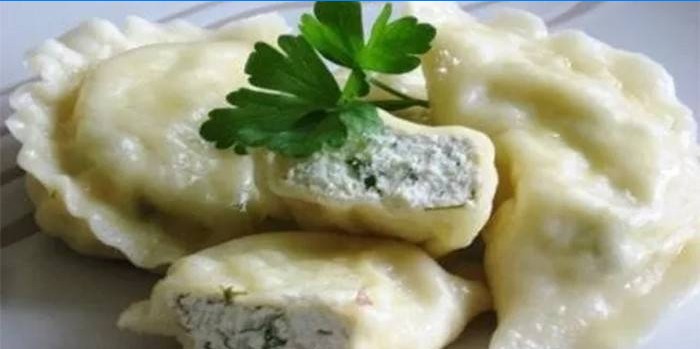 Dumplings with cottage cheese and herbs from custard dough
