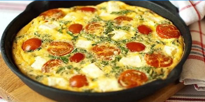 Ready omelet with tomatoes and mozzarella