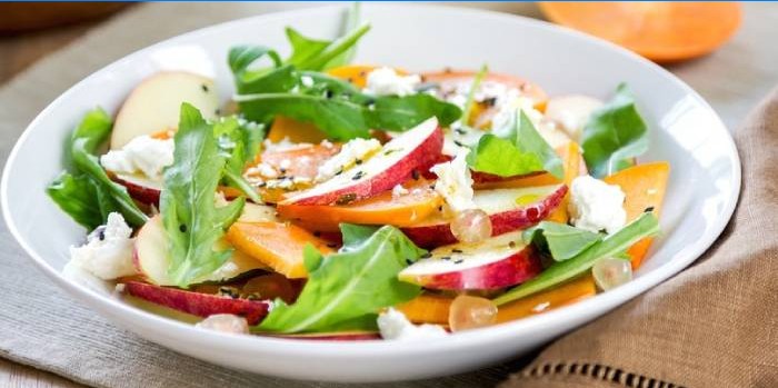 Persimmon, apple and goat cheese salad