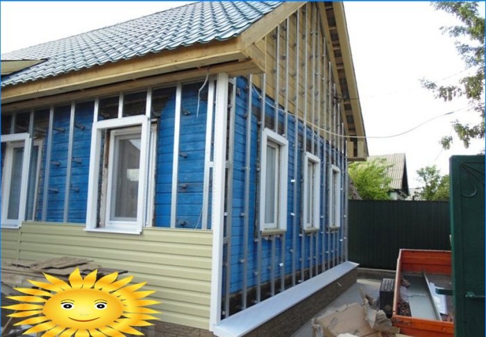 Thermal insulation of a wooden house for siding