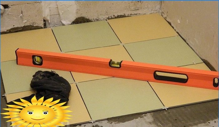 How to lay tiles on the floor with your own hands