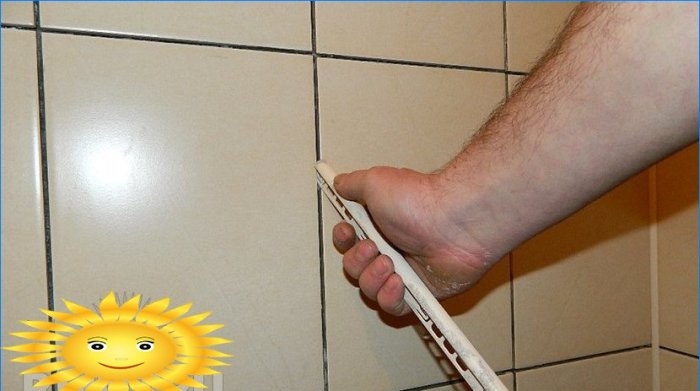 How to stick tiles on the wall