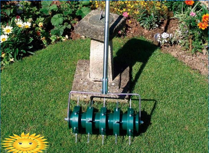 Lawn aerators and scarifiers