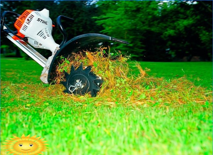 Lawn aerators and scarifiers