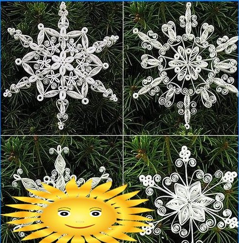 Paper lace snowflakes, made using quilling technique