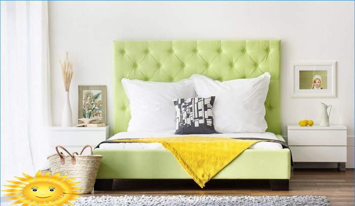 Yellow bedspread on olive bed