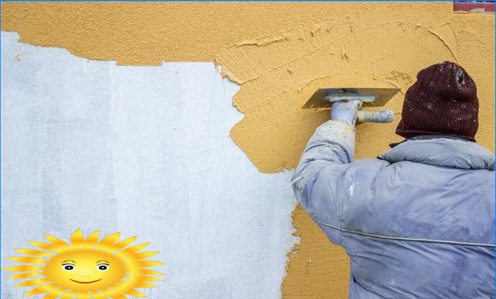 Application of facade plaster in winter
