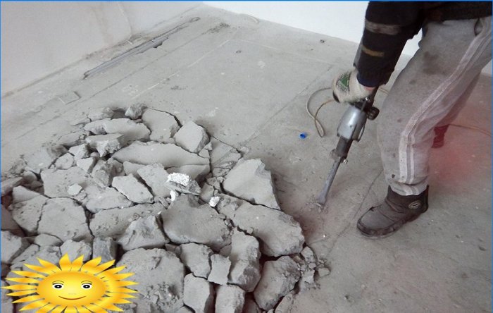 Dismantling a concrete screed with a jackhammer