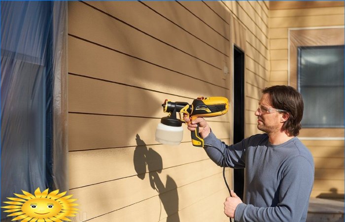 Using an electric spray gun when painting the facade