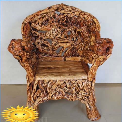 Carved wood armchair