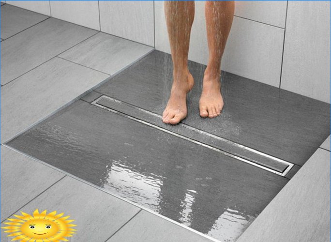 Shower drain under the tiles: rules for design and installation