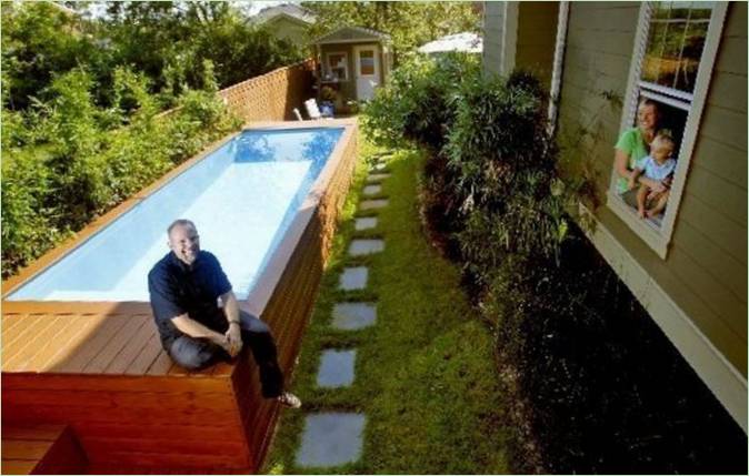 Swimming pool from improvised materials in the backyard of a private home
