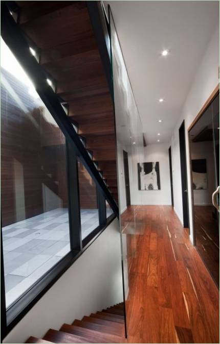 The staircase of the three-story Siamoises Mentana-Boyer apartment in Canada