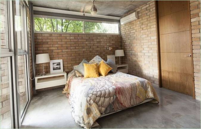 Stylish loft bedroom interior in Mexico