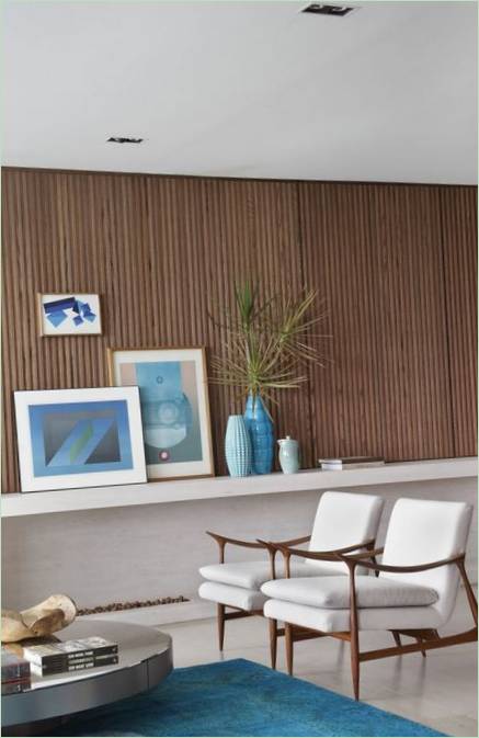 Living room interior in beige and blue tones