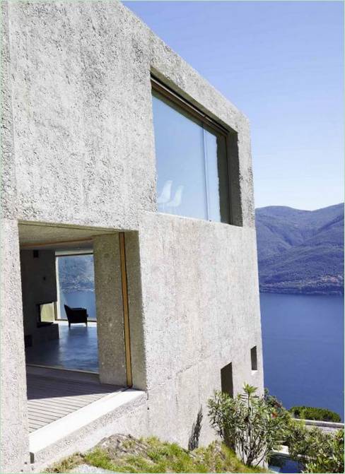 The windows of a concrete house in Brissago, Switzerland