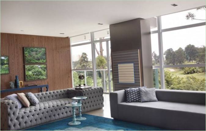 Living room interior in beige and blue tones