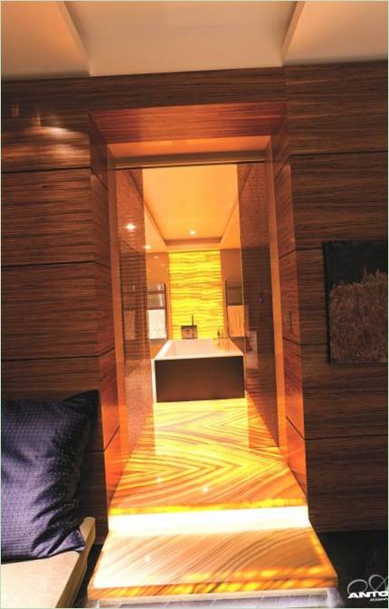 The hallway to the bathroom is performed with amber floor illumination