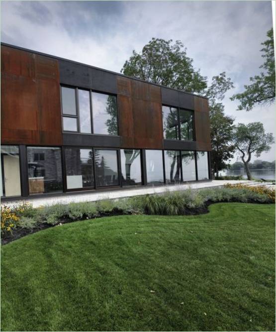 Panoramic windows and sliding glass doors in the interior of Bord-du-Lac House