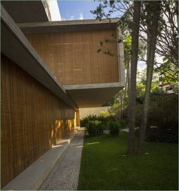 The beautiful combination of the fine caged bamboo product with the concrete slabs of The P House mansion