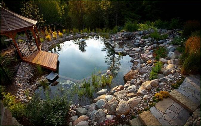 Landscape design of a site with a pond