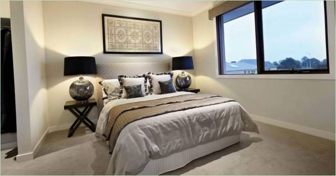 Lots of pillows on the large bed in one of the bedrooms of the Barwon MK2 residence