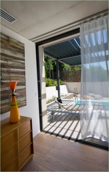 Blinds on the door to the swimming pool