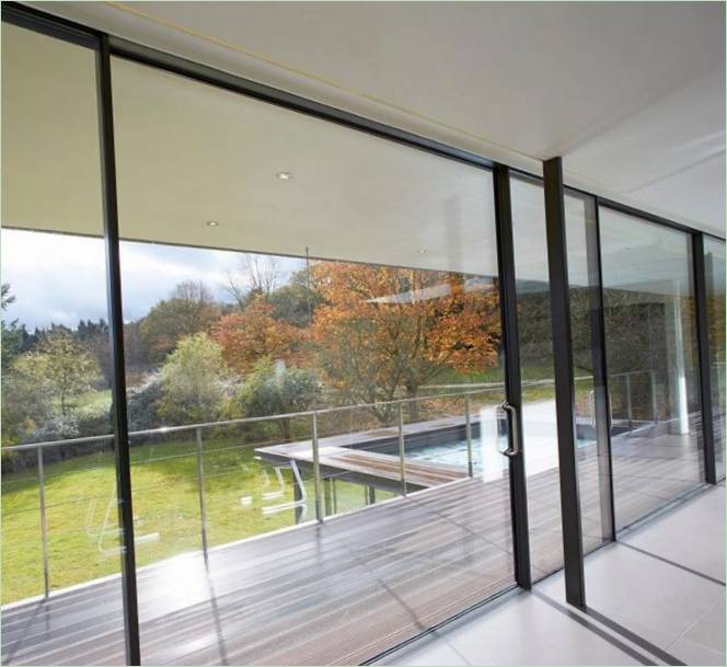 The sliding glass doors of a mansion in England