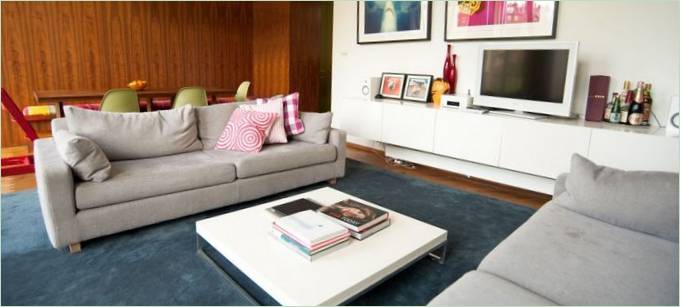 Upholstered sofas in the interior of the living room of the house Little Venice in England