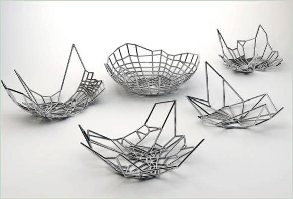 Designer metal baskets in the shape of woven spider web