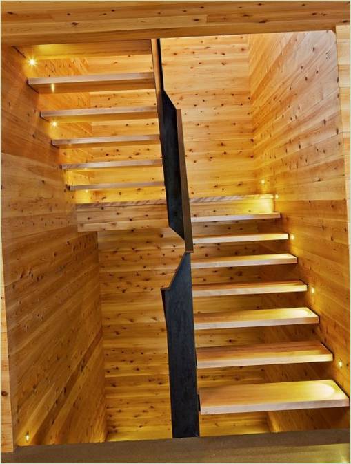 Wooden home design in Quebec: staircase with illuminated steps